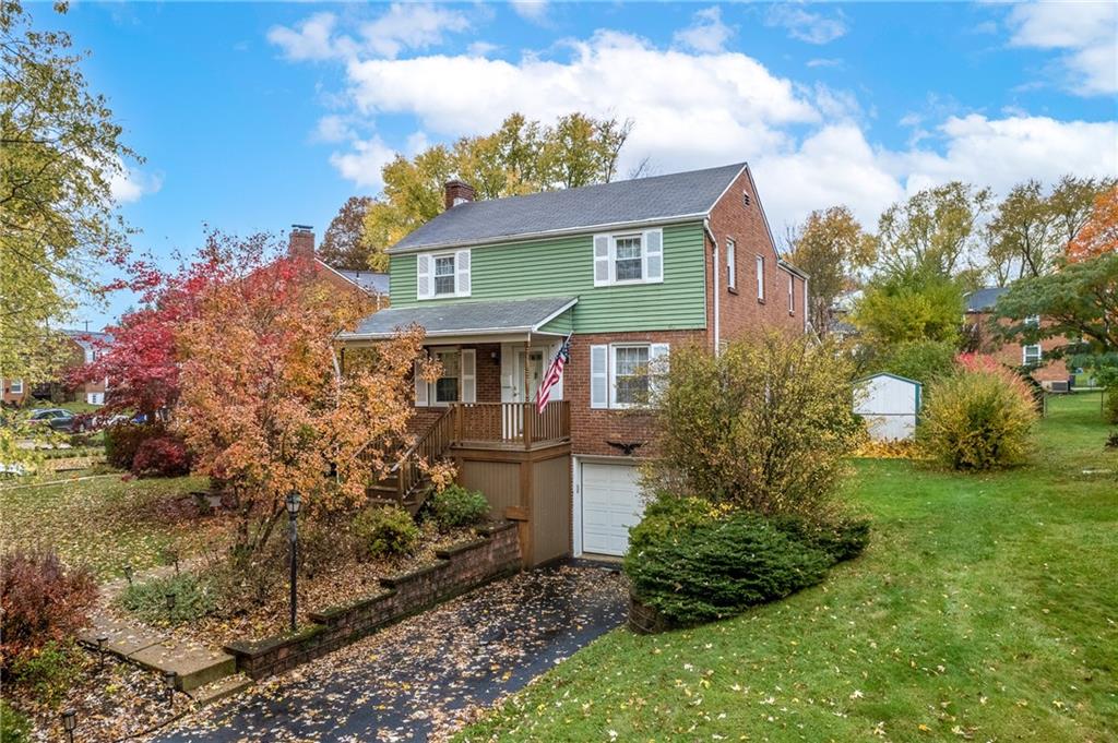 2058 Spring Valley Road Pittsburgh, PA 15243 - Photo 2 of 28 a front view of a house with garden