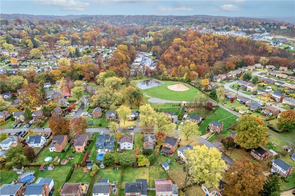 2058 Spring Valley Road Pittsburgh, PA 15243 - Photo 27 of 28 an aerial view of residential houses with outdoor space and trees
