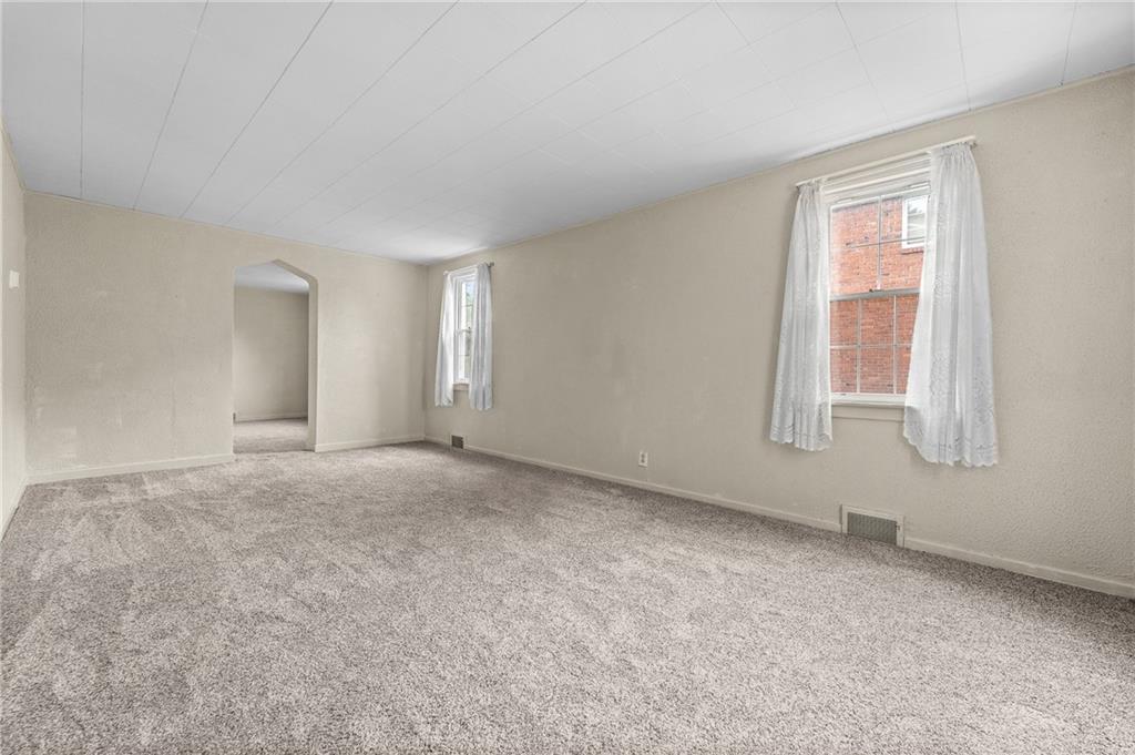 2058 Spring Valley Road Pittsburgh, PA 15243 - Photo 6 of 28 a view of an empty room with a window