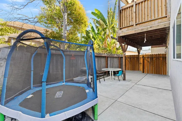 a view of a big room with wooden floor