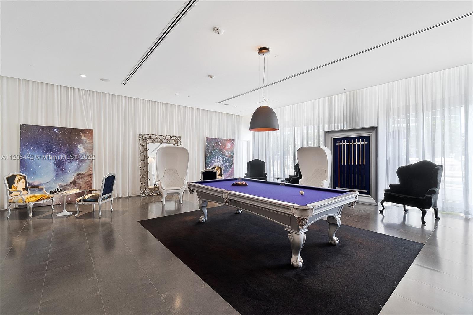 495 Brickell Avenue, Unit BAY405 Miami, FL 33131 - Photo 24 of 25 a room with furniture pool table and a window