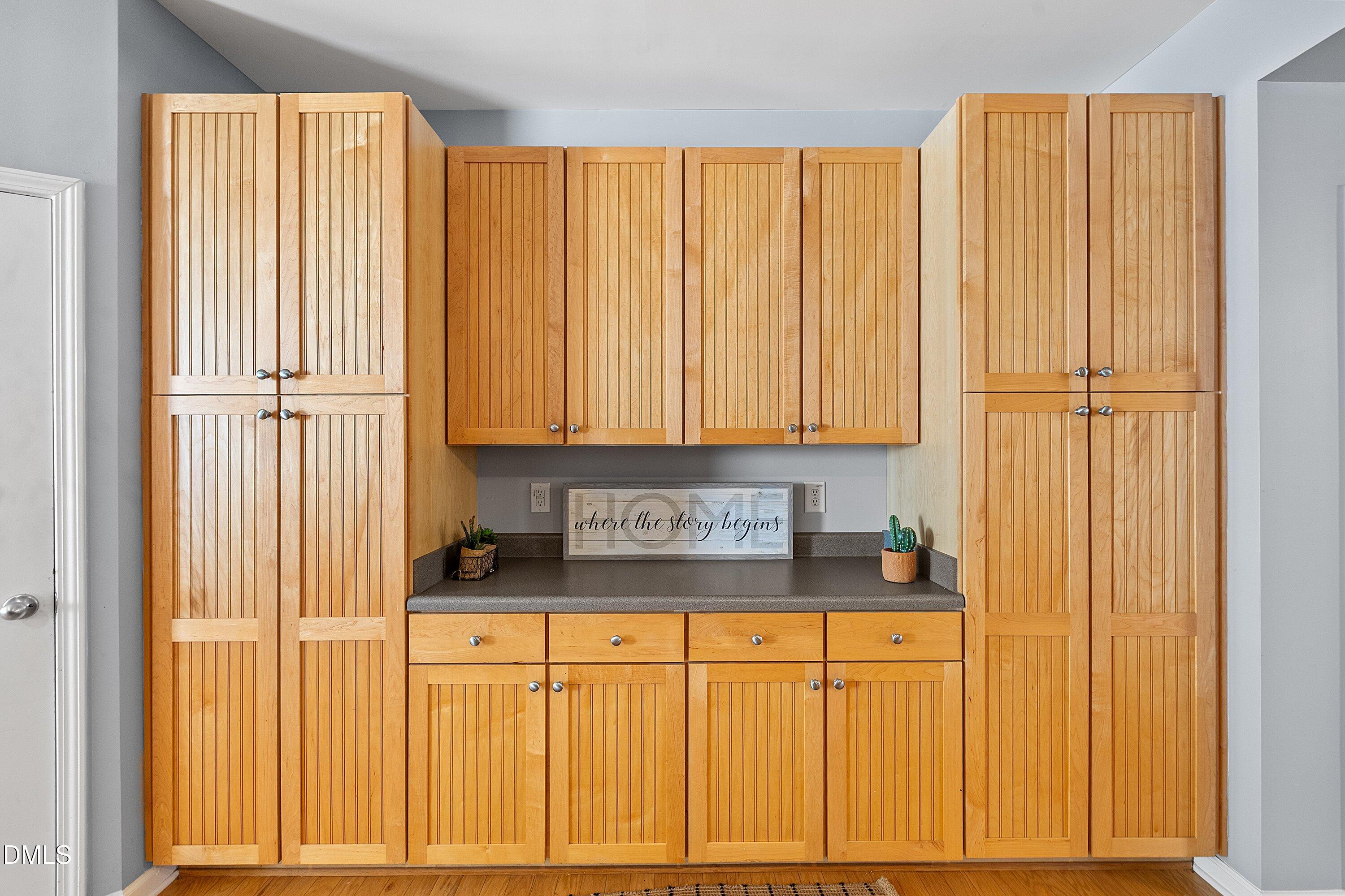 3114 Rapid Falls Road Cary, NC 27519 - Photo 13 of 37 a bathroom with a granite countertop sink and cabinets