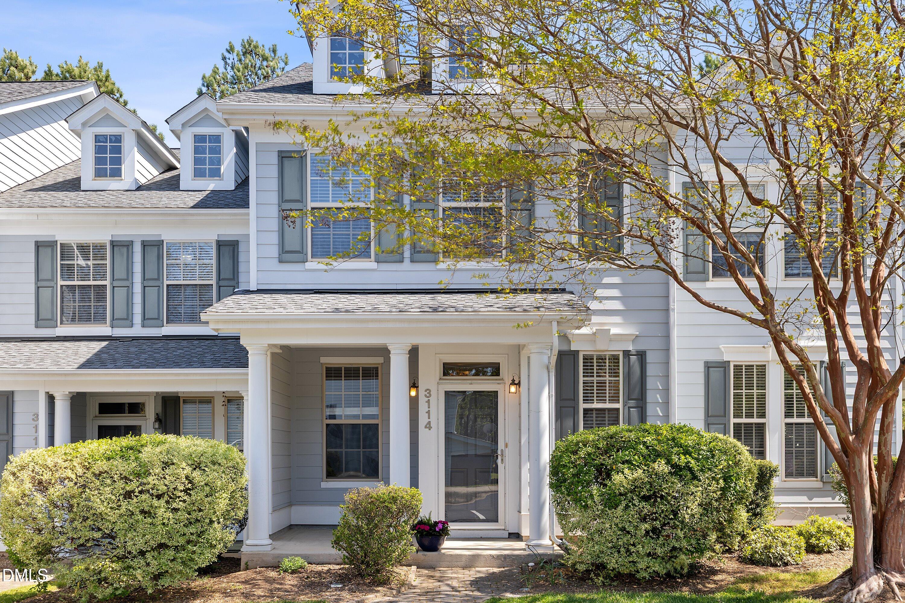 3114 Rapid Falls Road Cary, NC 27519 - Photo 2 of 37 front view of a brick house with a large windows