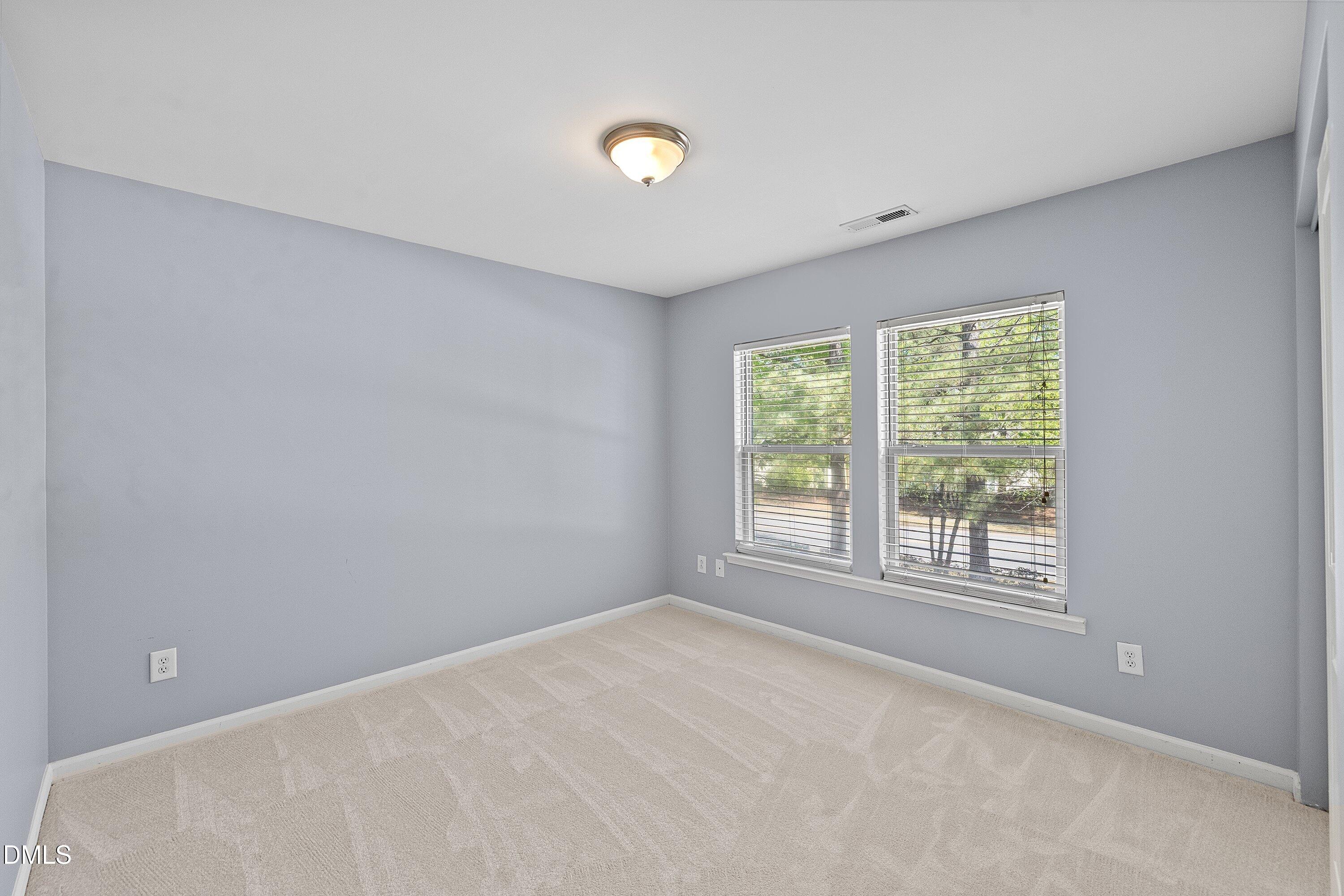 3114 Rapid Falls Road Cary, NC 27519 - Photo 30 of 37 a view of an empty room with a window