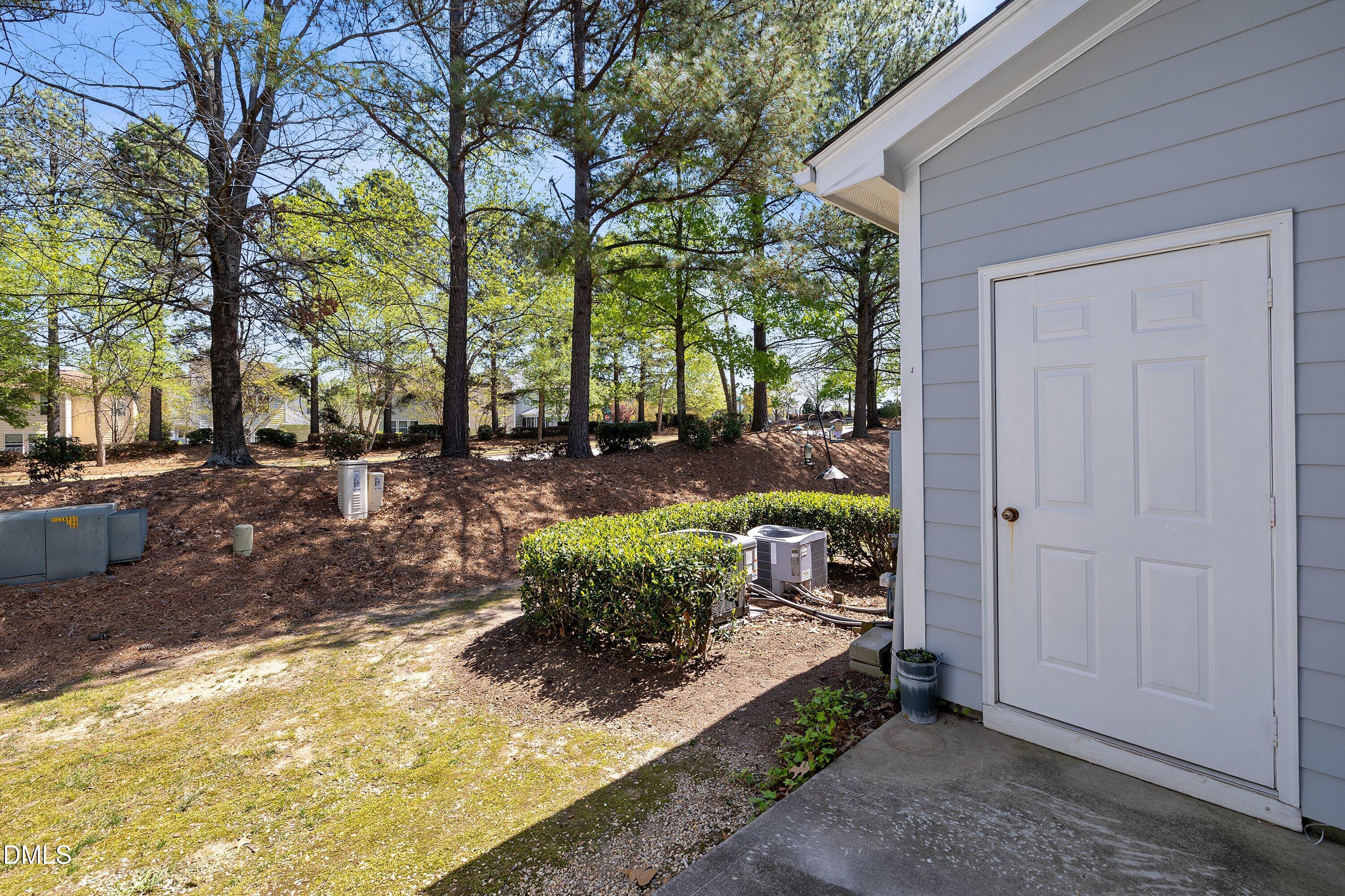 3114 Rapid Falls Road Cary, NC 27519 - Photo 32 of 37 a view of a yard with large tree
