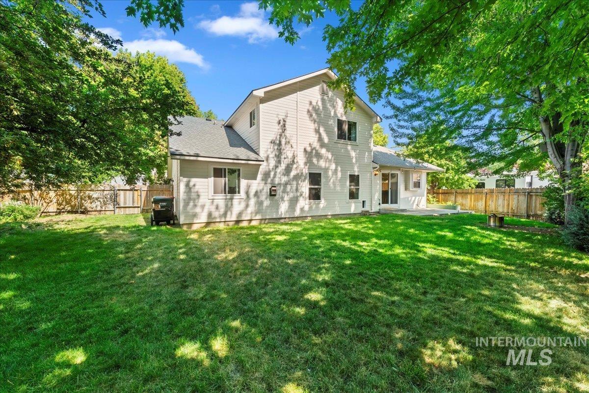 3411 North Summercrest Way Meridian, ID 83646 - Photo 26 of 30 Rear view of property featuring a patio area and a fenced backyard