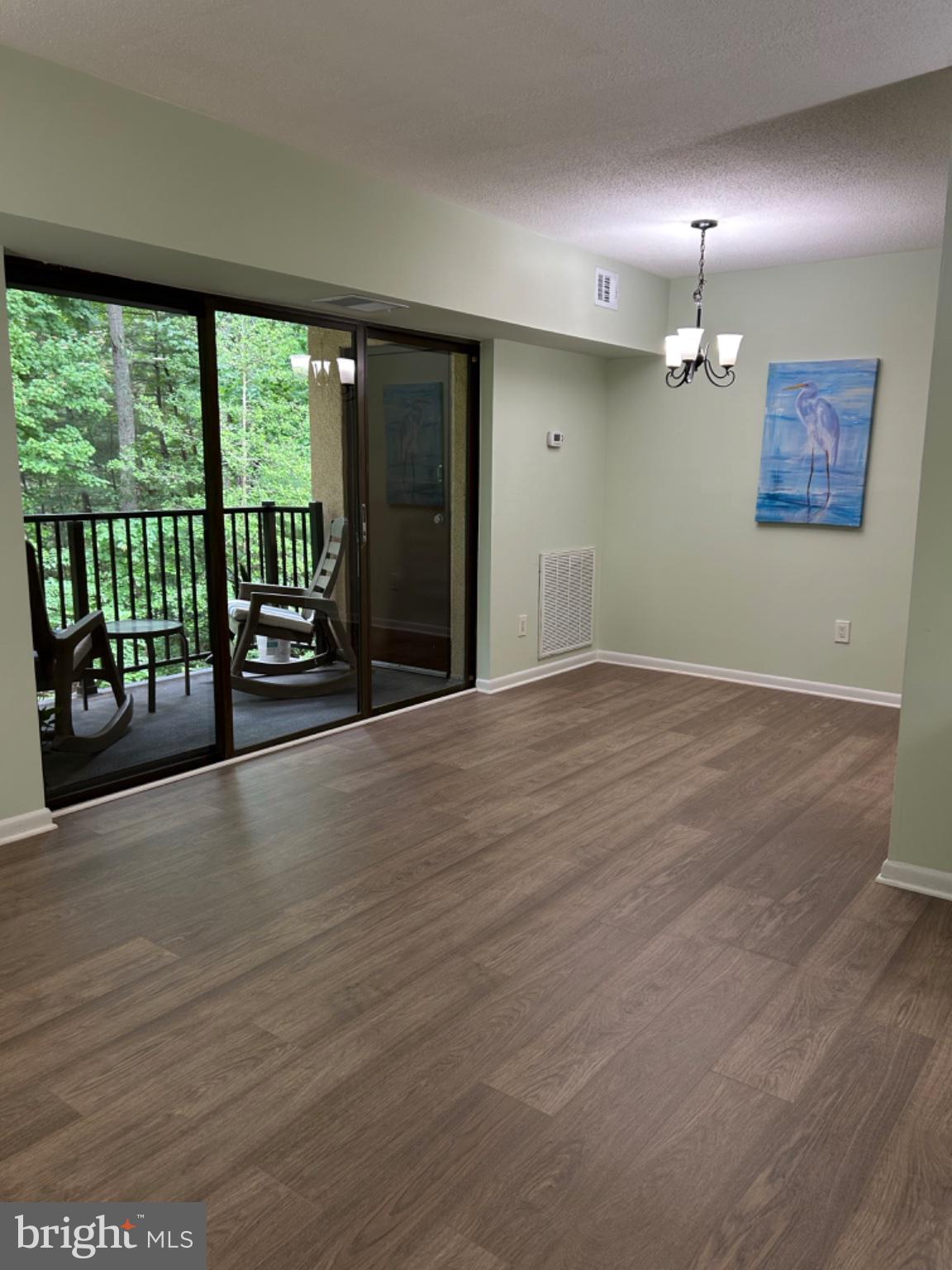 11609 Stoneview Square, Unit 11C Reston, VA 20191 - Photo 24 of 30 Bright, airy space with nature views.