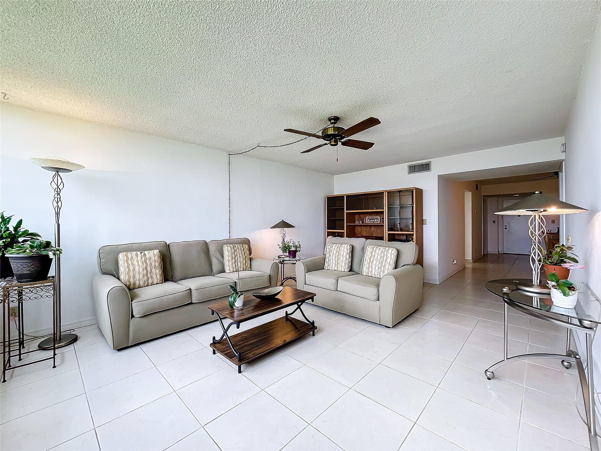 16300 Golf Club Road, Unit 809 Weston, FL 33326 - Photo 22 of 42 Family room with ceiling fan
