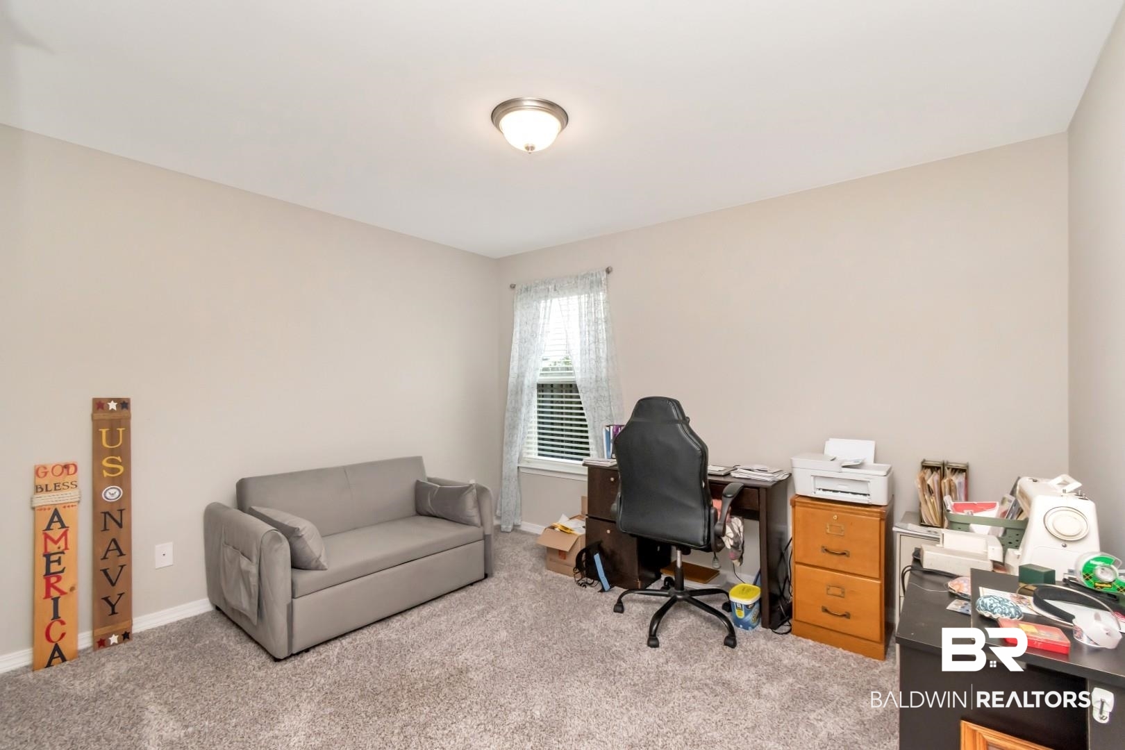 1295 Hayward Loop Foley, AL 36535 - Photo 21 of 29 Carpeted room with neutral paint finishes