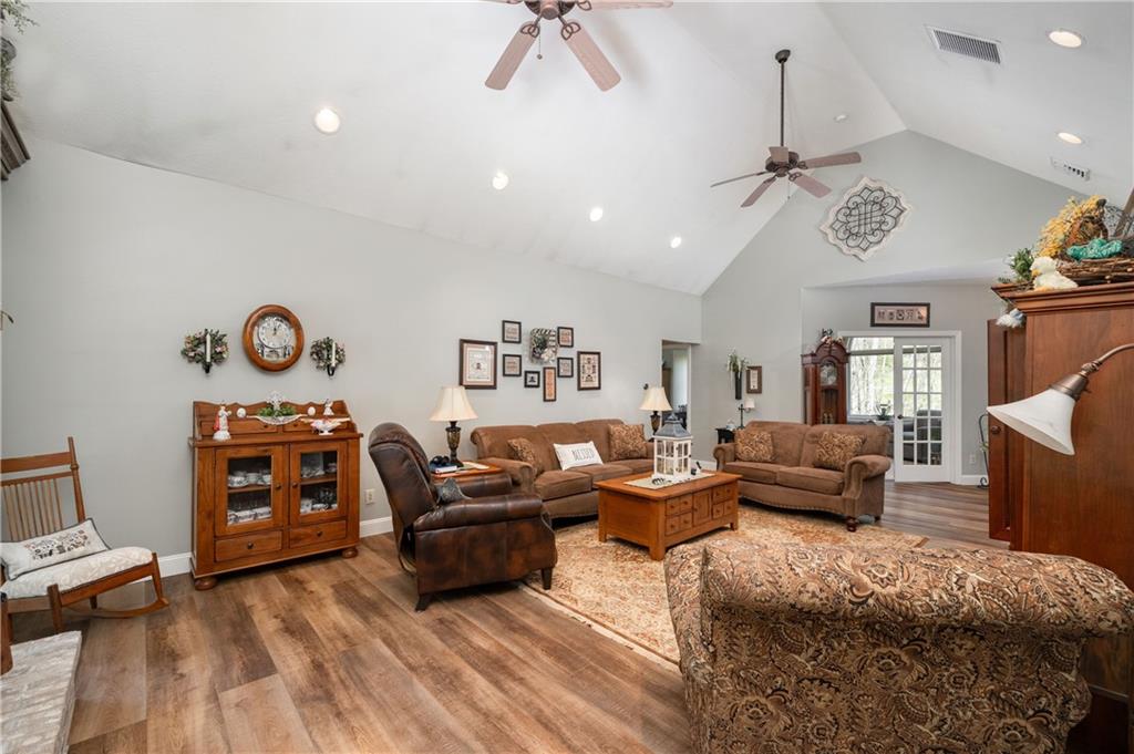 825 Whitestown Road Butler, PA 16001 - Photo 11 of 49 a living room with furniture and a flat screen tv