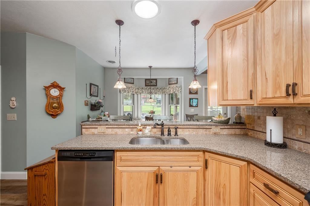 825 Whitestown Road Butler, PA 16001 - Photo 17 of 49 a kitchen with stainless steel appliances granite countertop a sink and a cabinets