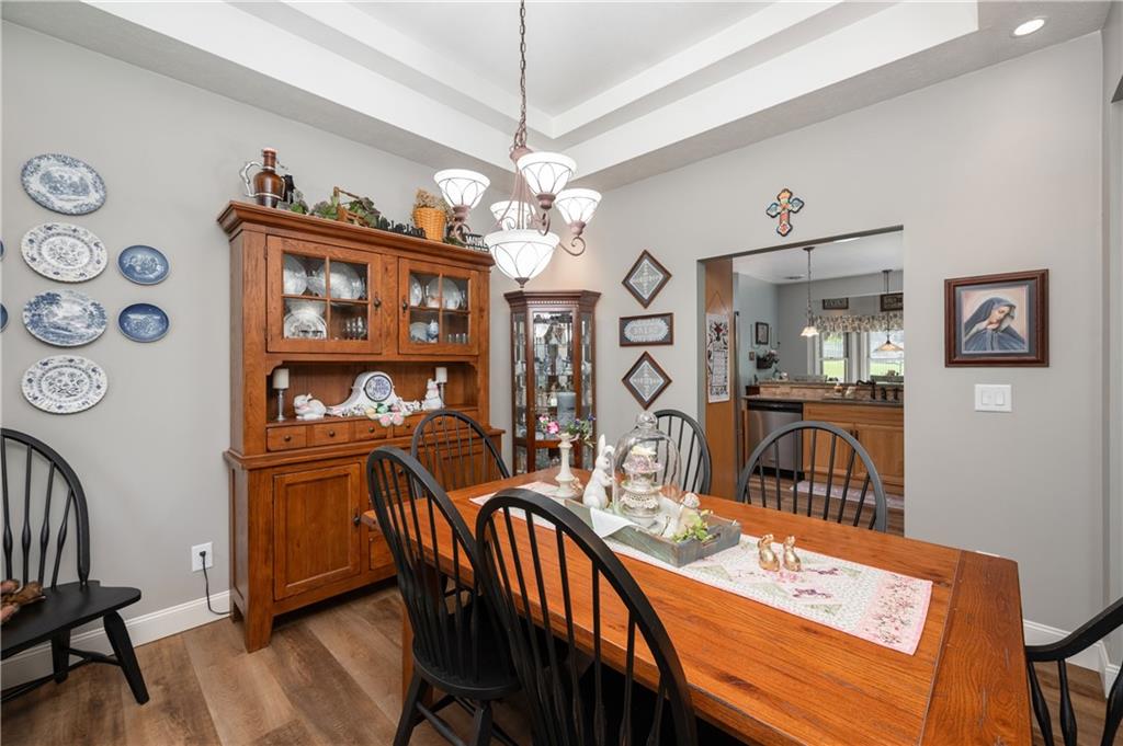 825 Whitestown Road Butler, PA 16001 - Photo 19 of 49 a view of a dining room with furniture and wooden floor