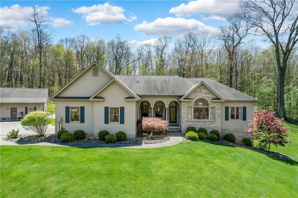 825 Whitestown Road Butler, PA 16001 - Photo 2 of 49 a front view of house with yard and green space