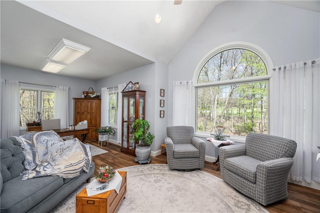 825 Whitestown Road Butler, PA 16001 - Photo 26 of 49 a living room with furniture and a large window