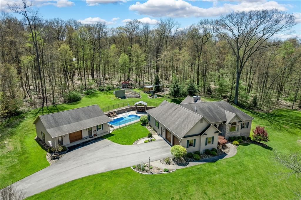 825 Whitestown Road Butler, PA 16001 - Photo 3 of 49 an aerial view of a house with backyard garden and outdoor seating