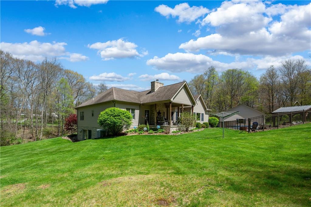 825 Whitestown Road Butler, PA 16001 - Photo 40 of 49 a view of a house with a big yard and large trees