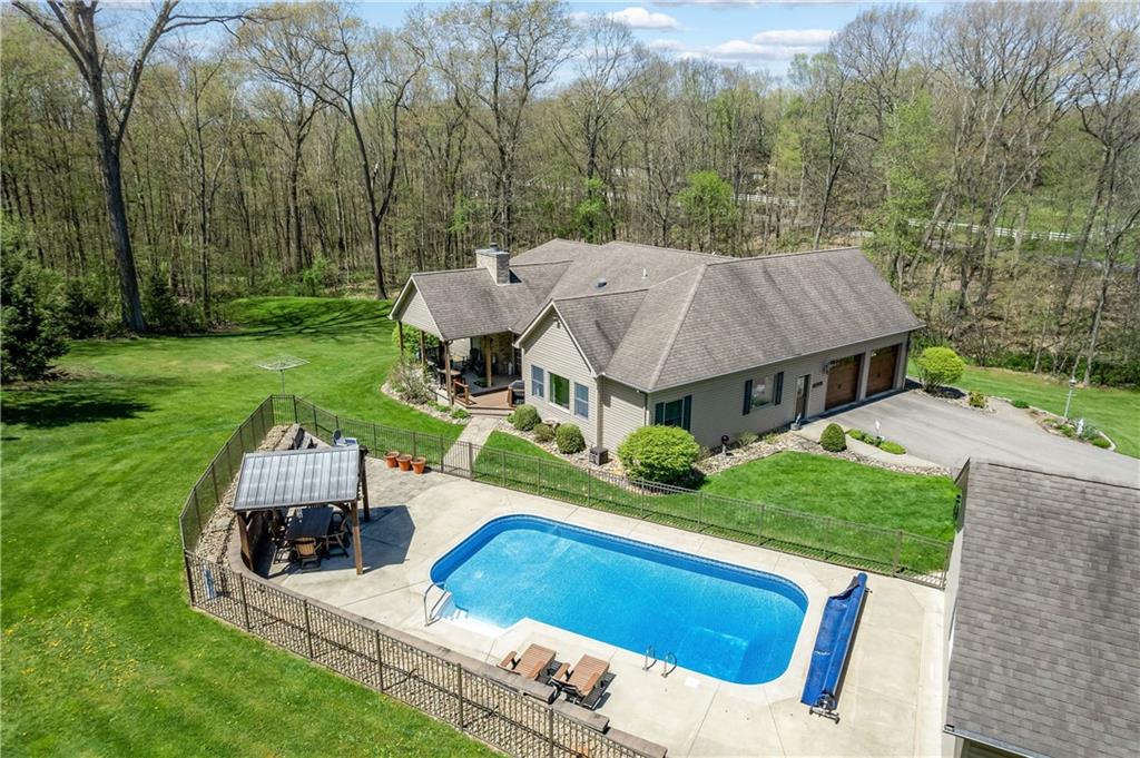 825 Whitestown Road Butler, PA 16001 - Photo 47 of 49 a view of house with backyard entertaining space and garden
