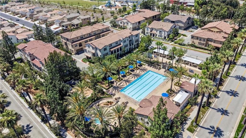 849 The Promenade, Unit D Azusa, CA 91702 - Photo 35 of 37 an aerial view of residential house with outdoor space and trees all around