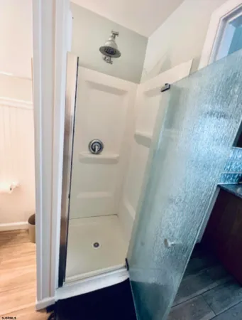 a bathroom with a sink and a shower