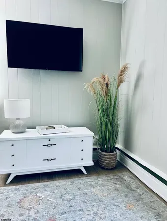 a view of a potted plant sitting in a kitchen