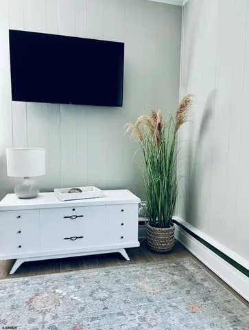a view of a potted plant sitting in a kitchen