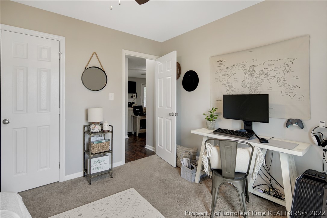 7096 Rockfish Road Raeford, NC 28376 - Photo 30 of 40 a workspace with furniture and a window