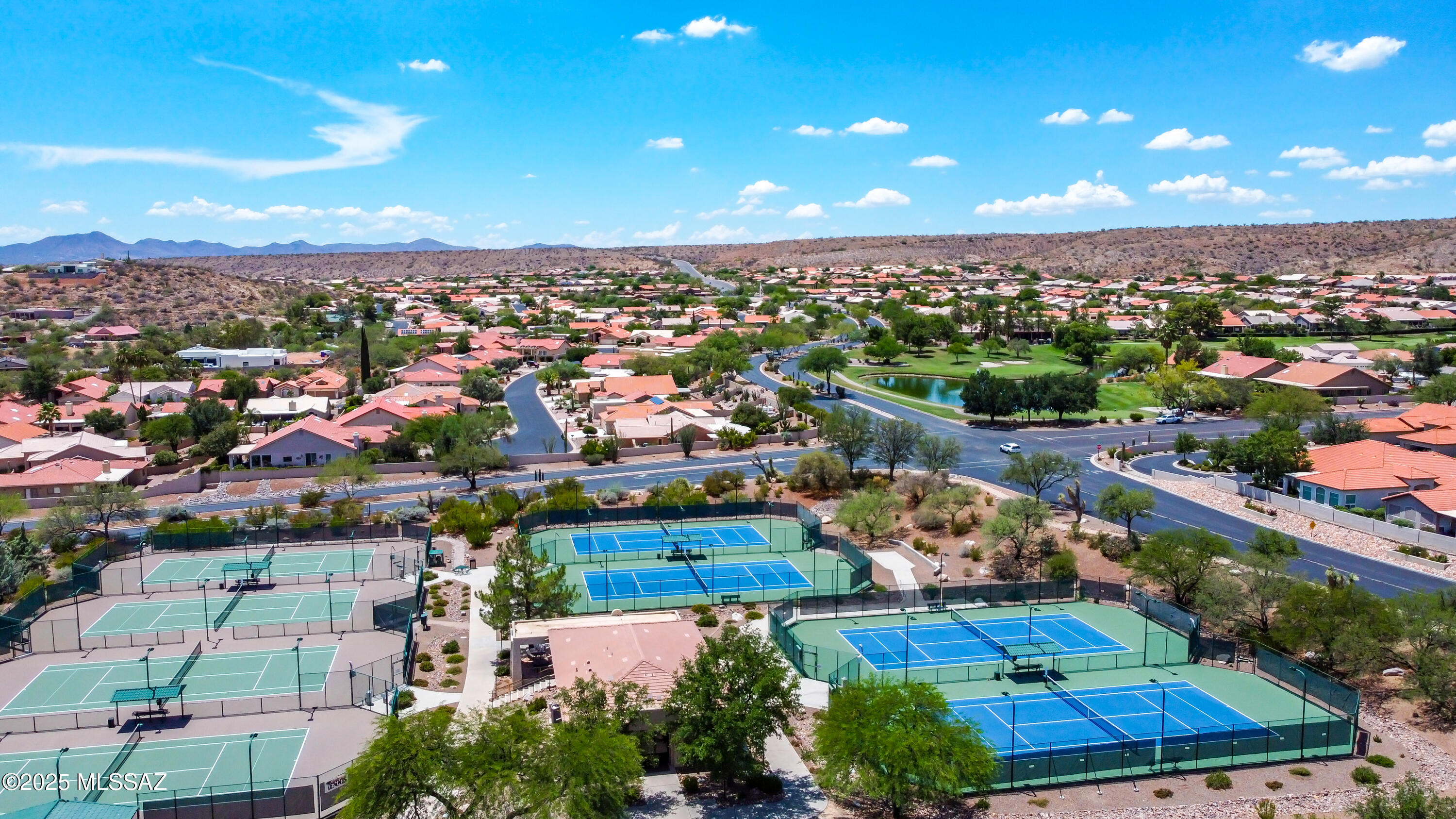 35890 Mesa Ridge Drive Tucson, AZ 85739 - Photo 29 of 31 an aerial view of a houses with a lake