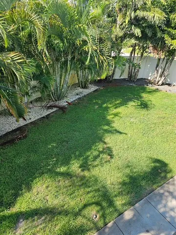 a view of a house with a swimming pool
