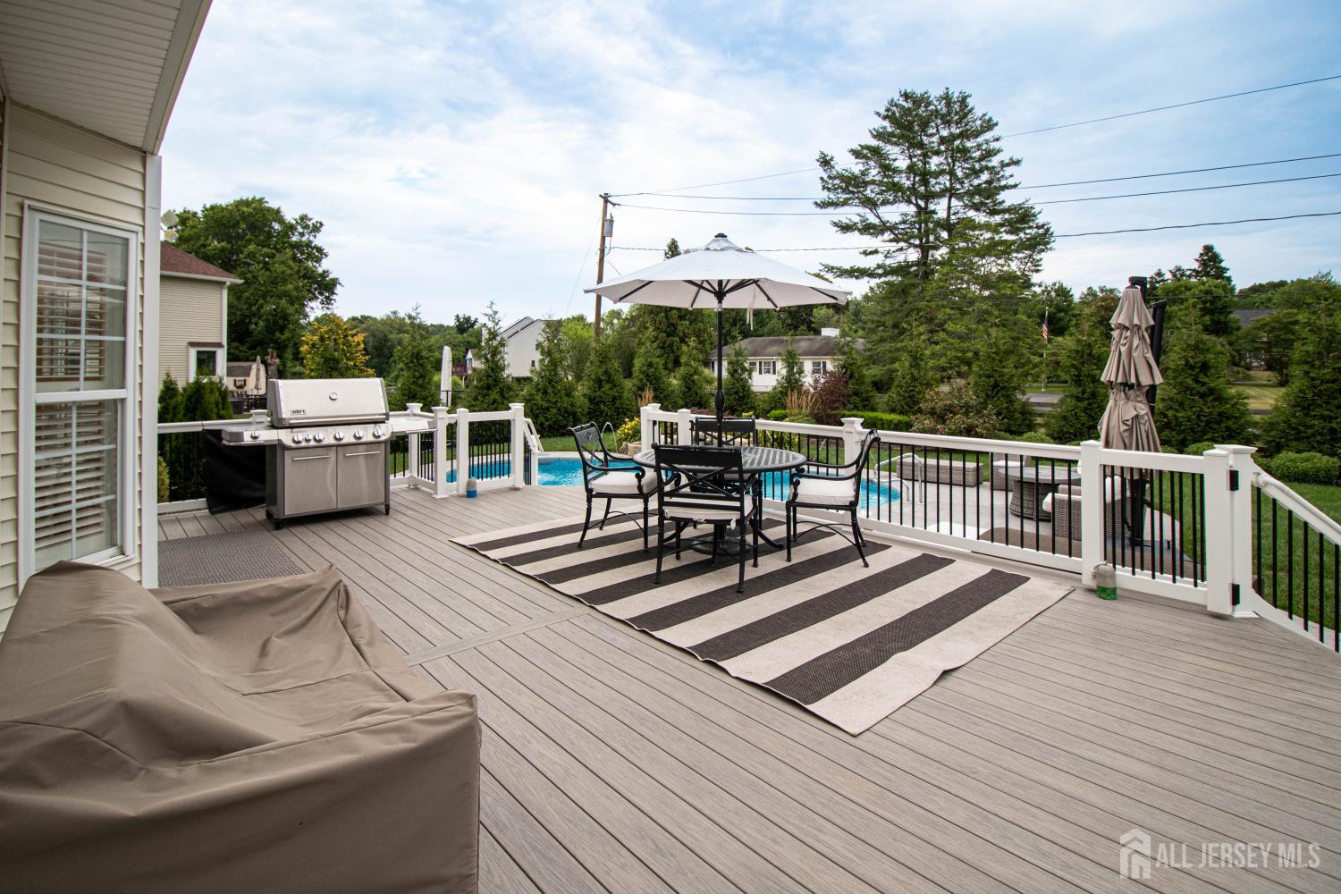 9 Pondview Drive Tinton Falls, NJ 07724 - Photo 38 of 41 a view of a roof deck with couches