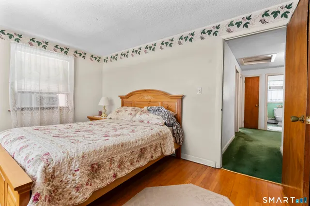 a room with furniture toys and a window