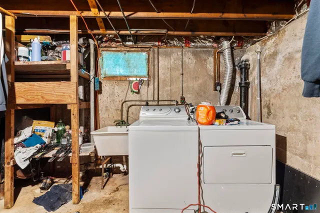 a bathroom with a sink a toilet and a bathtub