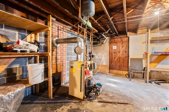 a workspace with furniture and a window