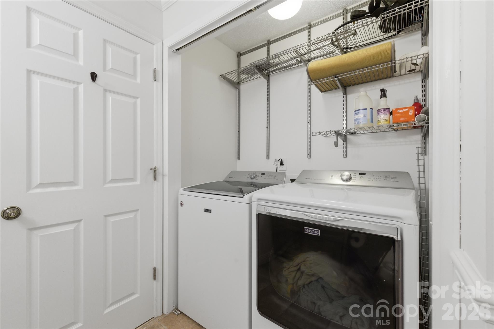 308 Queens Road, Unit 32 Charlotte, NC 28204 - Photo 20 of 30 a utility room with dryer and washer