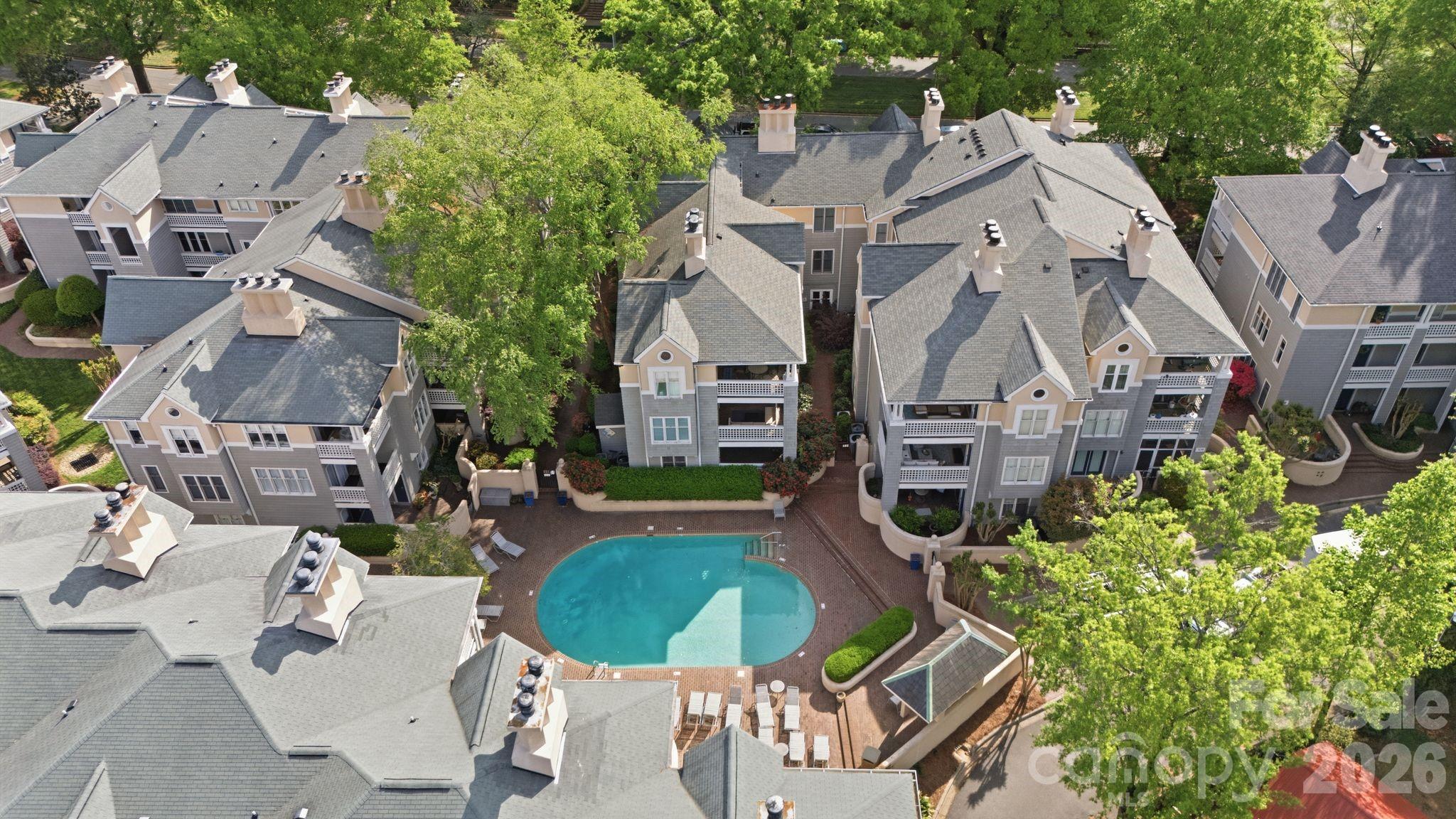 308 Queens Road, Unit 32 Charlotte, NC 28204 - Photo 25 of 30 an aerial view of a house with outdoor space and sitting area