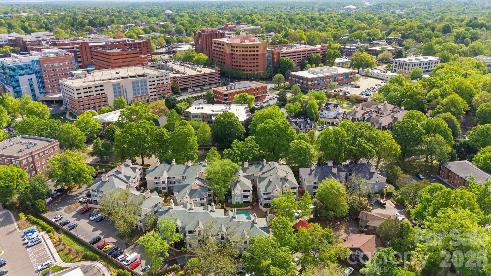 308 Queens Road, Unit 32 Charlotte, NC 28204 - Photo 26 of 30 an aerial view of a city with lots of residential buildings