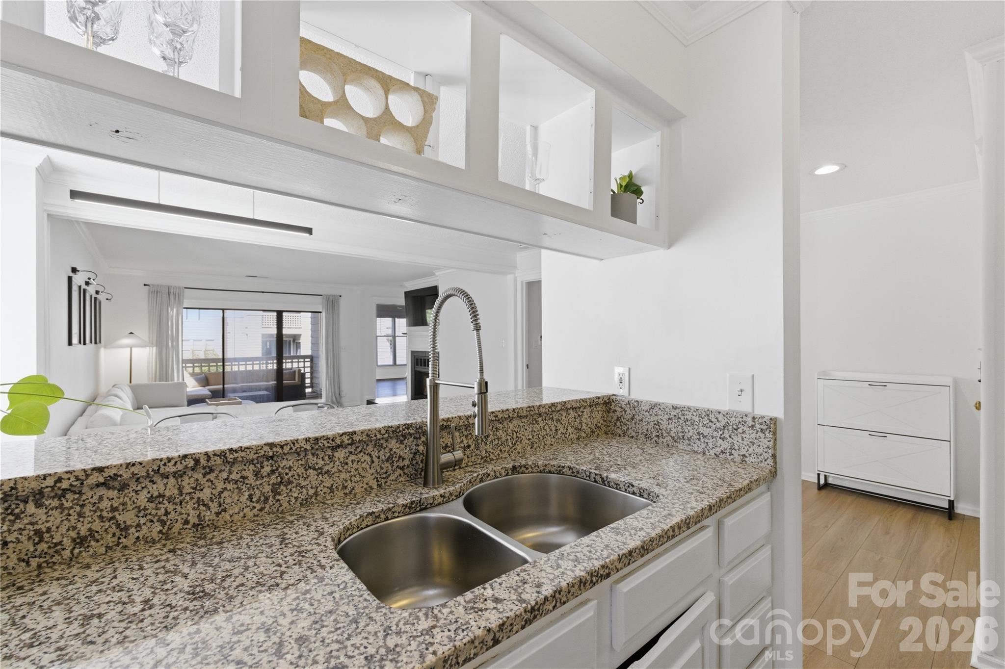 308 Queens Road, Unit 32 Charlotte, NC 28204 - Photo 6 of 30 a kitchen with a sink and a stove top oven