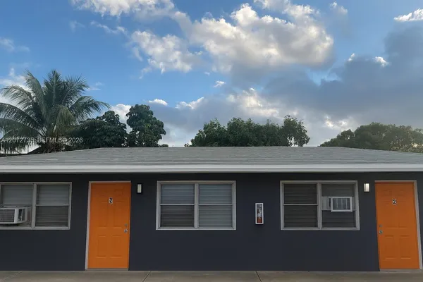 a front view of house with yard
