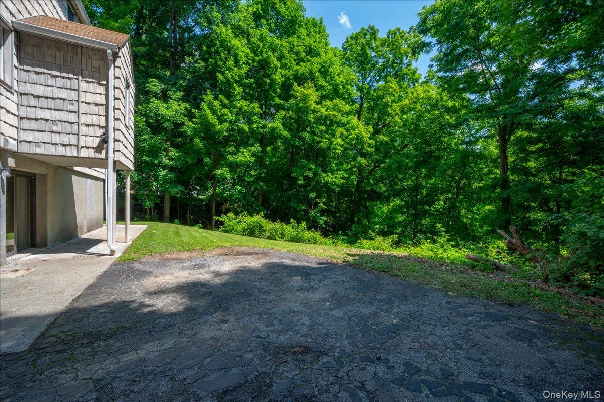 105 High St Extension Mount Kisco, NY 10549 - Photo 11 of 38 a view of road and yard
