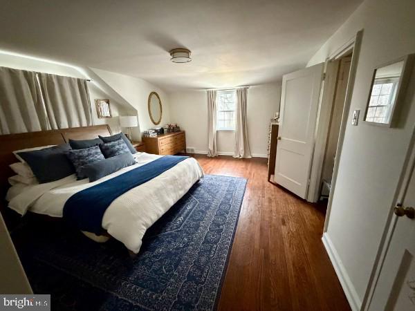 307 Candlewood Road Broomall, PA 19008 - Photo 13 of 18 a bedroom with bed and wooden floor