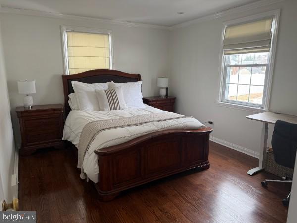 307 Candlewood Road Broomall, PA 19008 - Photo 10 of 18 a large bed sitting in a bedroom next to a window