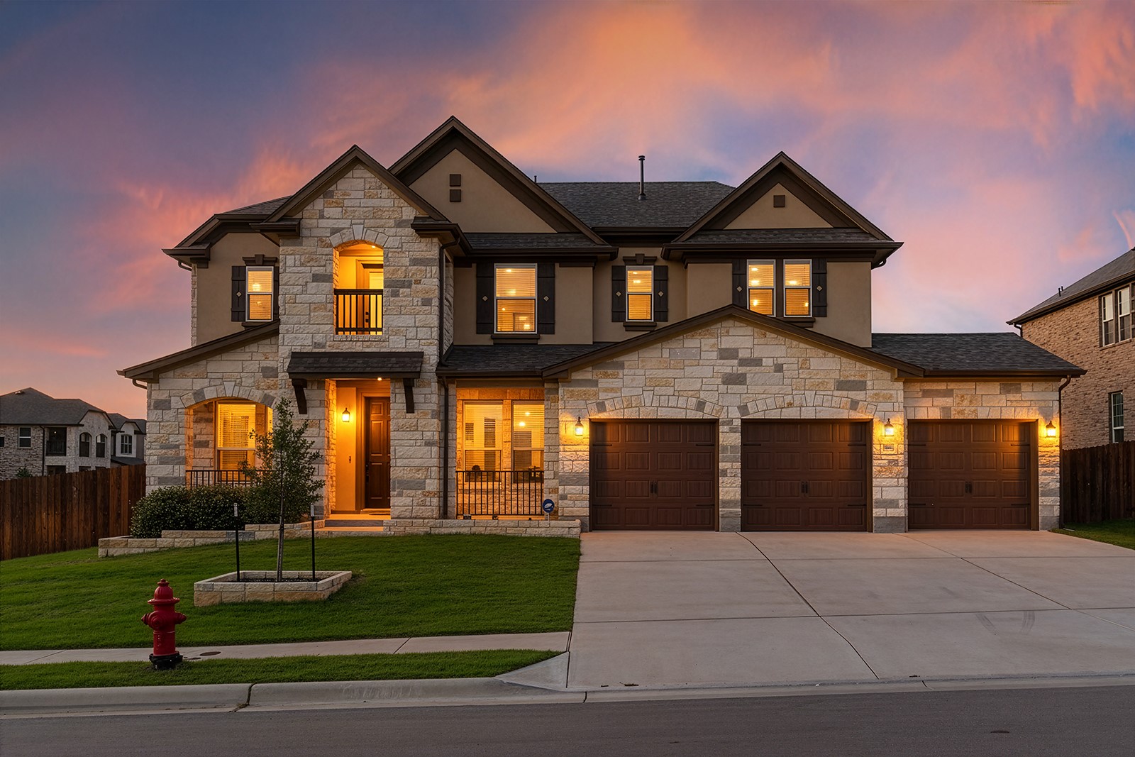 4600 Ercolano Lane Round Rock, TX 78665 - Photo 1 of 37 Stone and stucco exterior with dark trim accents