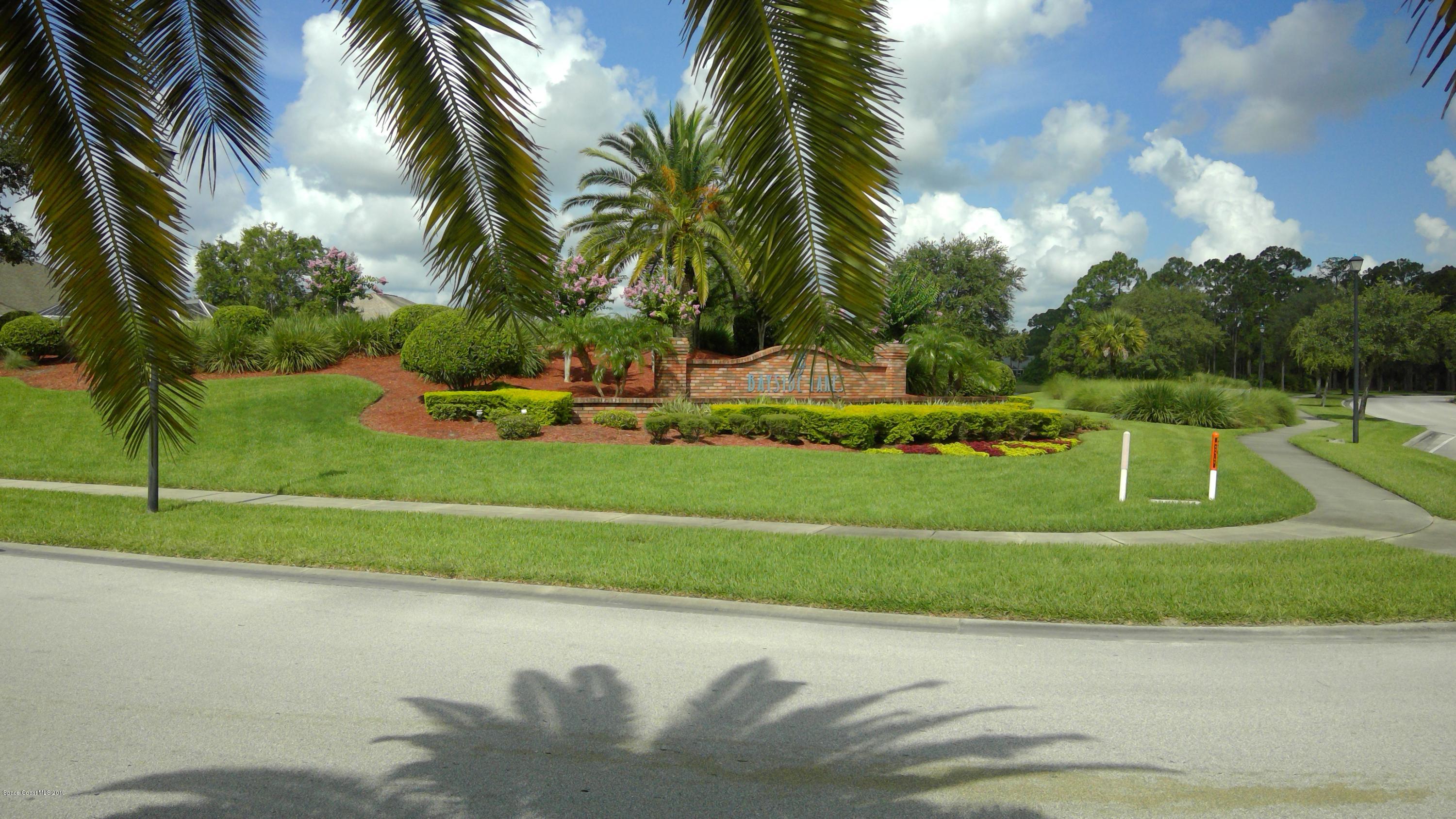 872 Old Country Rd S East Palm Bay, FL 32909 - Photo 16 of 29 Bayside Lakes clubhouse Entrance