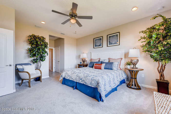 872 Old Country Rd S East Palm Bay, FL 32909 - Photo 9 of 29 The Delray-small-008-3-Master Bedroom-66