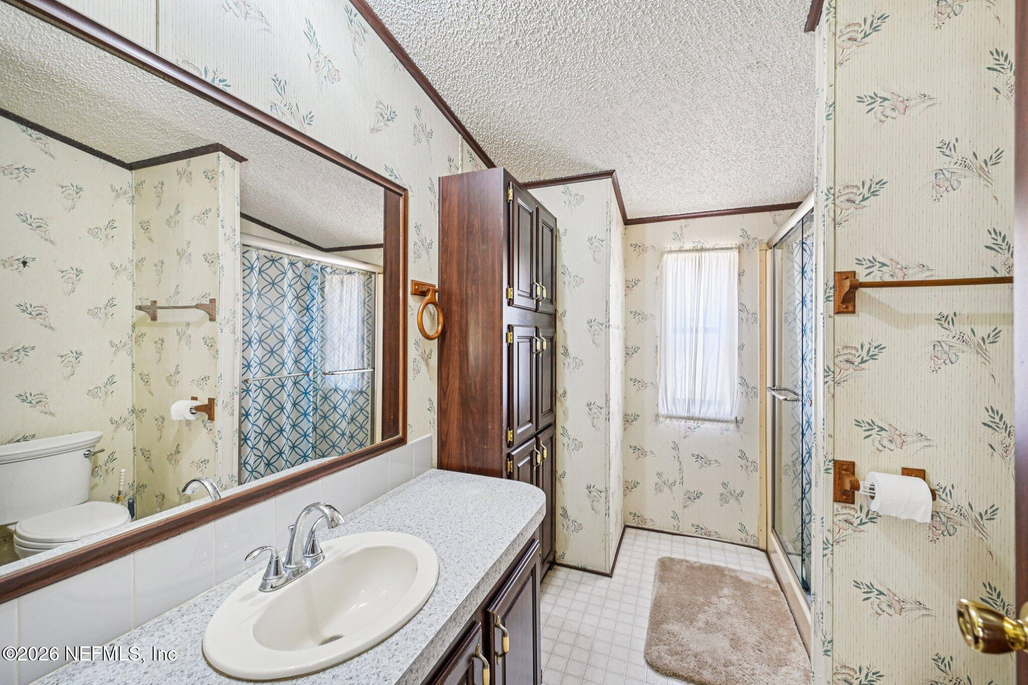 128 Sesame Street Middleburg, FL 32068 - Photo 46 of 66 Guest Bathroom