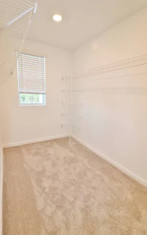 a bathroom with a double vanity sink and mirror