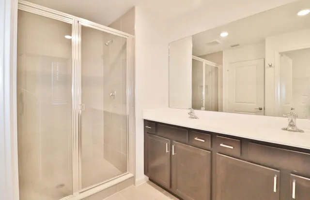 a bathroom with a toilet and a window