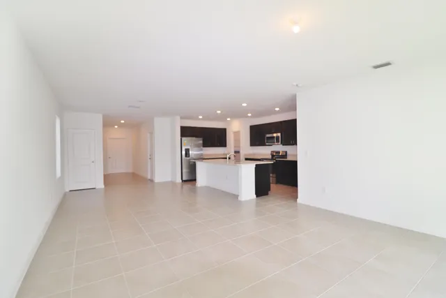 a view of a kitchen with a sink