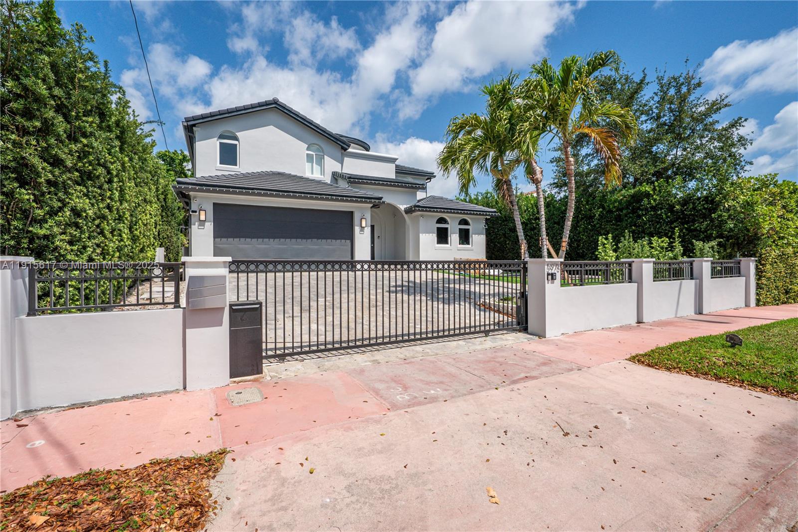5978 Alton Road Miami Beach, FL 33140 - Photo 5 of 40 a front view of a house with a porch