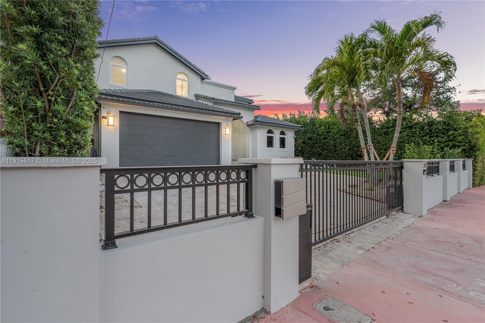 5978 Alton Road Miami Beach, FL 33140 - Photo 7 of 40 a view of a entrance gate of a house