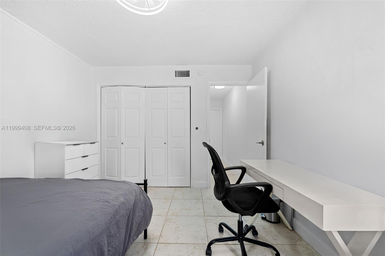 515 Southwest 3rd Street, Unit 6 Miami, FL 33130 - Photo 10 of 19 a view of a workspace with furniture